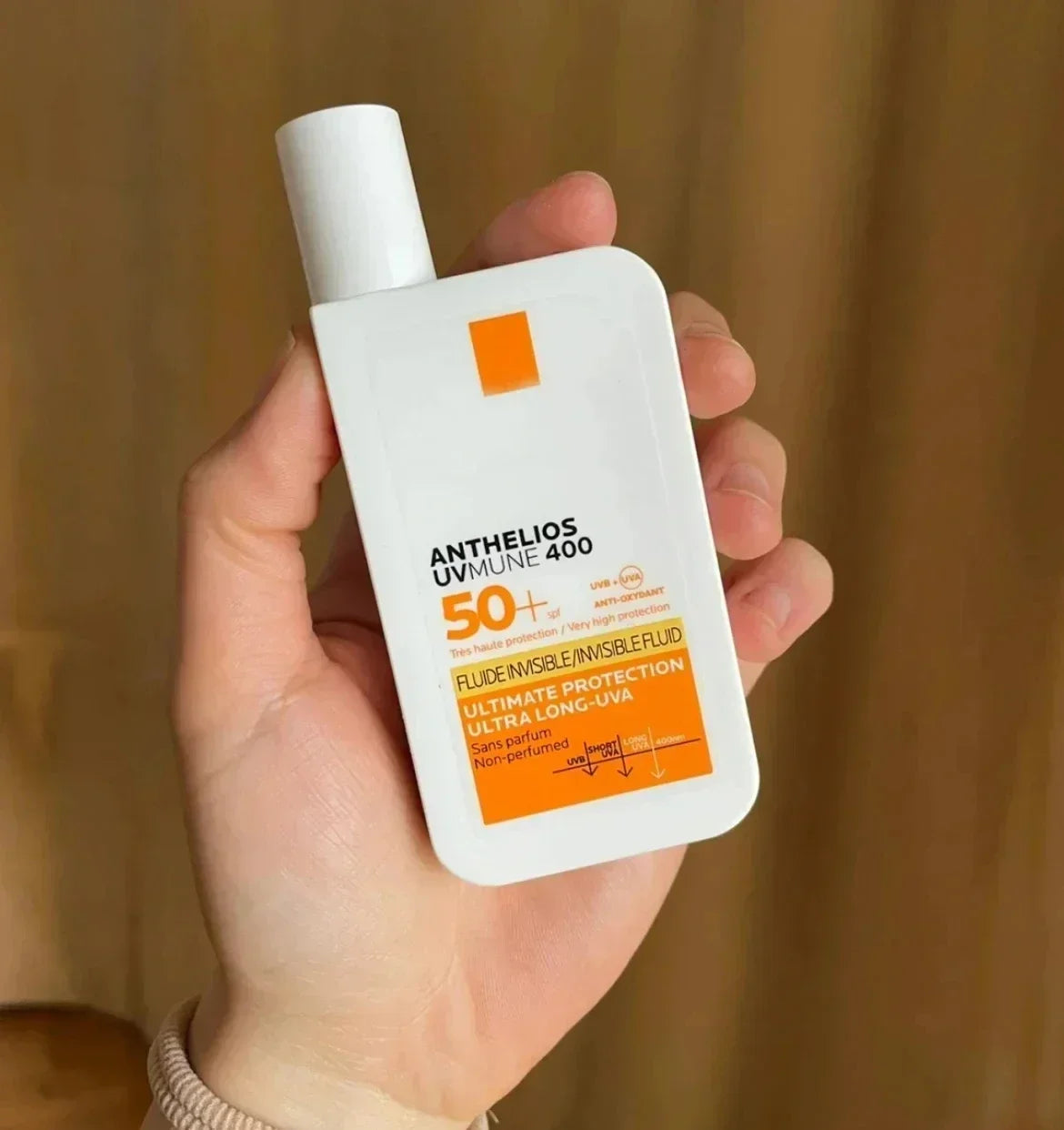 f- Crème solaire ANTHELIOS